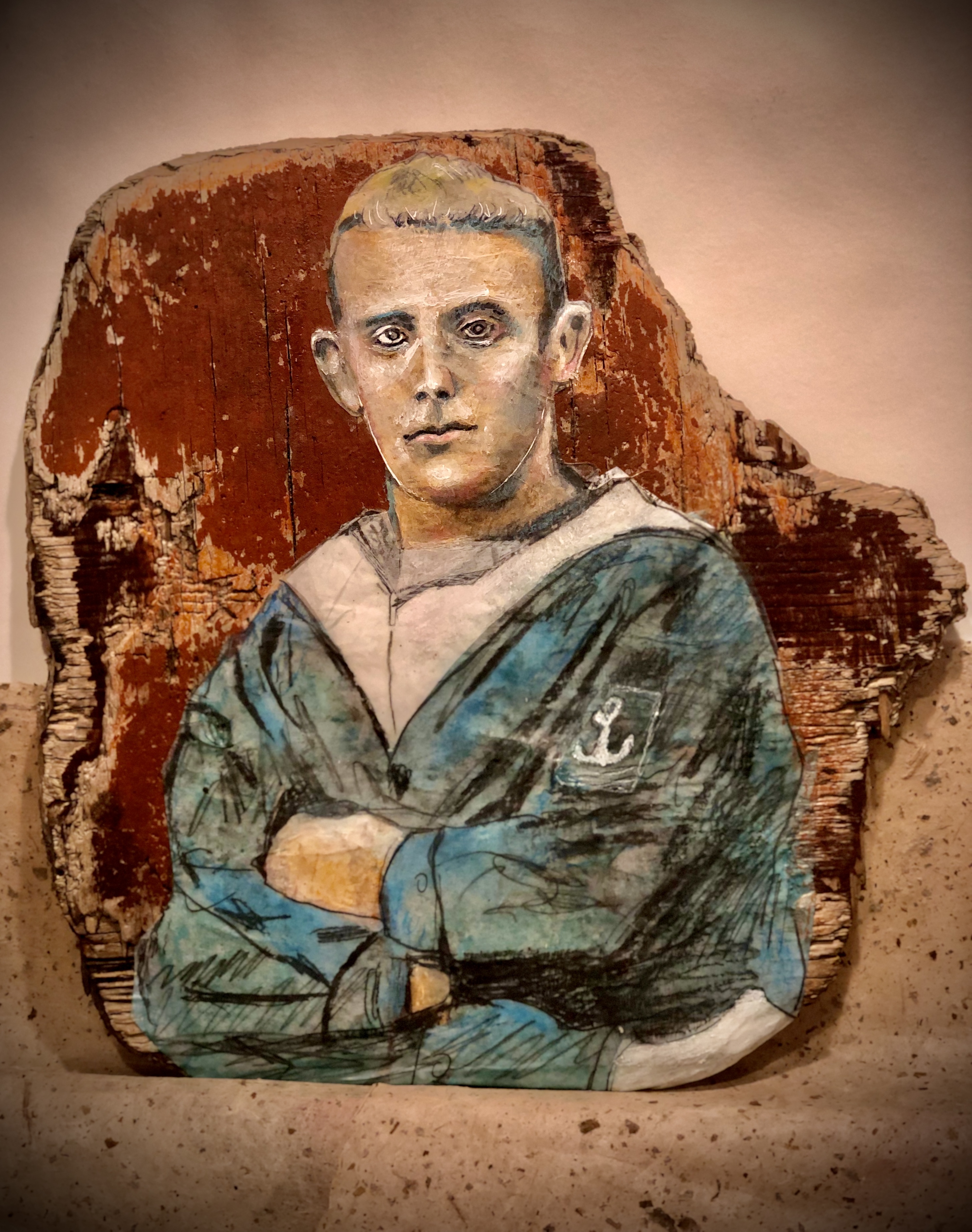 painting of a sailor on wood