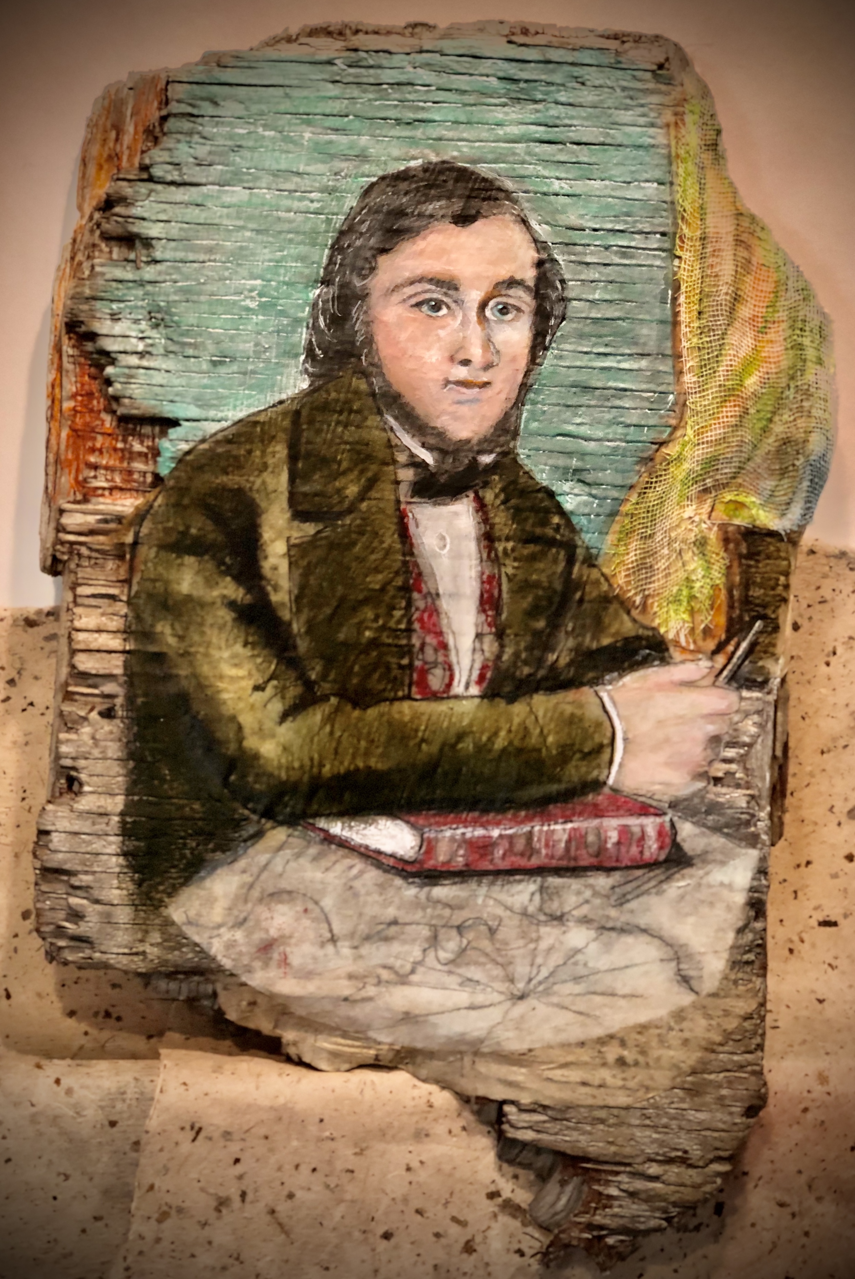 painting of a young sea captain on wood