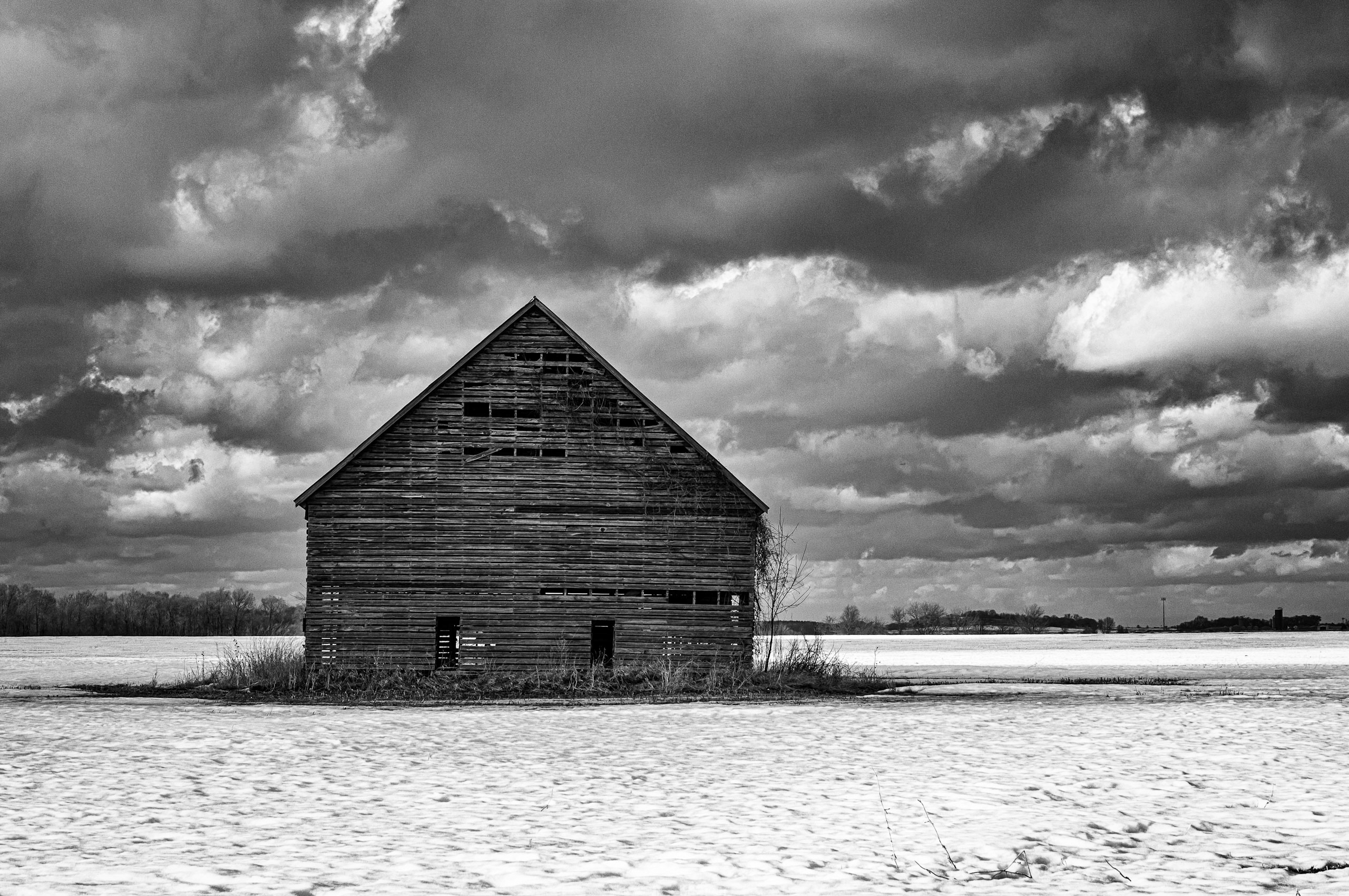 black and white photograph of a barn
